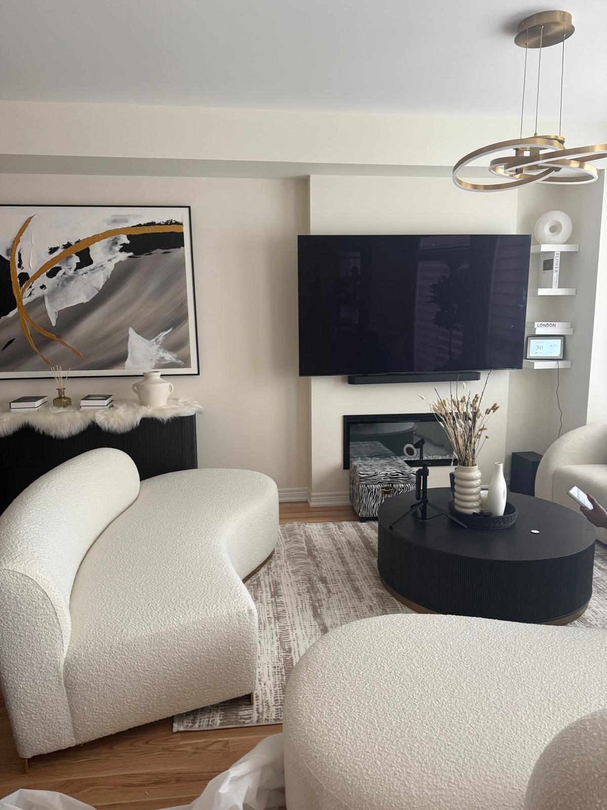 Modern living room with sculptural furniture and natural textures